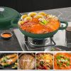 The enamel cast iron soup pot features a circular shower-style lid design and is suitable for various tools, such as ceramic, gas